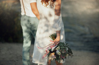 The bride and groom in nature. Rustic Wedding